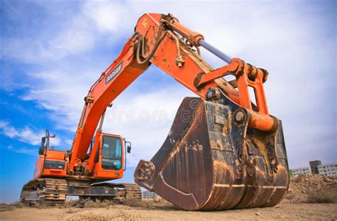 Red Excavator Under The Blue Sky Picture Image 109926934