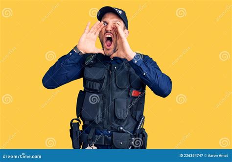 Young Handsome Man Wearing Police Uniform Shouting Angry Out Loud With