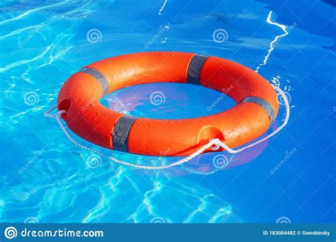 Lifebuoy Pool Ring Float Life Ring In Swimming Pool Stock Photo