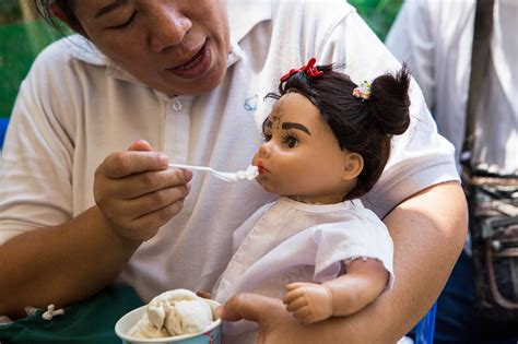 Thailand's Intriguing 'Luk Thep' Doll Culture | Time