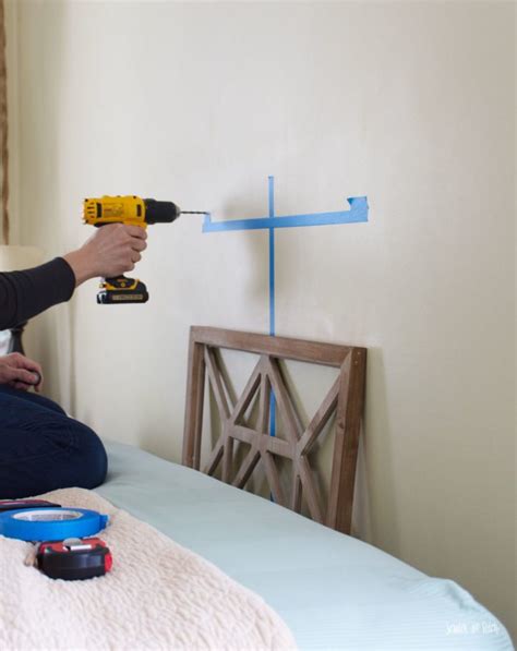 This faux brick paneling is part of a diy project. Easy DIY Headboard made from Decorative Wall Panels