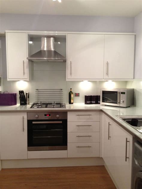 My beautiful white high gloss kitchen with glass worktop & glass splash
