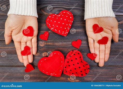 A Woman Holds A Red Heart In Her Hands Love Concept Stock Image