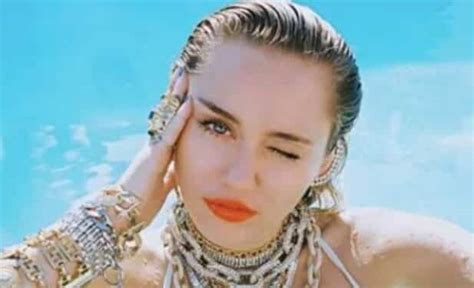 Miley Cyrus Shows Off Her Jewelry In Bikini Photos
