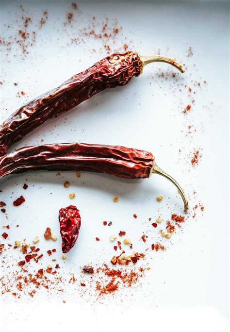Red Chili On White Surface · Free Stock Photo