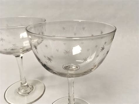a pair of victorian star etched champagne glasses 575645 uk