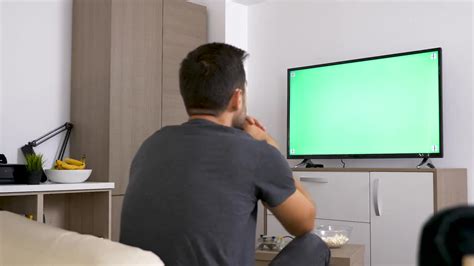Watching TV With Green Screen - Stock Video | Motion Array