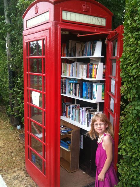 Old phone box stock photos (total results: Found an old red phone box converted into a 'lending ...