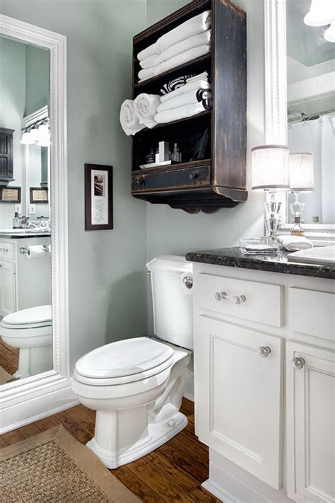 Bathroom storage, green bathroom, green and white bathroom. Over The Toilet Storage Ideas for Extra Space - Hative