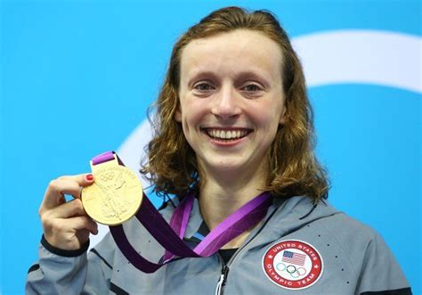 Gold Medalist Katie Ledecky Of The United States Poses On The Podium