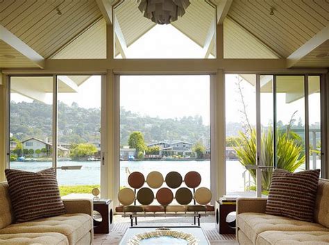 Drapes make an excellent window treatment on these spans of windows, as they can be swept aside during the day to maintain the views of nature and. Large Windows And How To Decorate Around Them