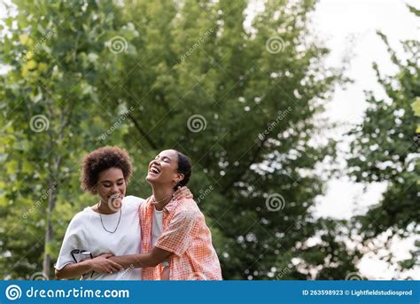 Joyful African American Lesbian Woman Hugging Stock Image Image Of Trendy Outdoors 263598923