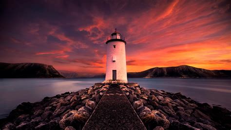 Lighthouse At Sunset 4k Ultra Hd Wallpaper Background Image 3840x2160 Id880817