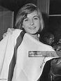 Pia Lindström, daughter of actress Ingrid Bergman, examines a foulard ...