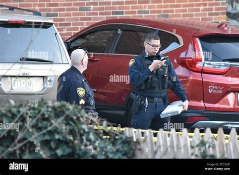 Belleville, New Jersey, USA. 16th Dec, 2023. Police officers search for