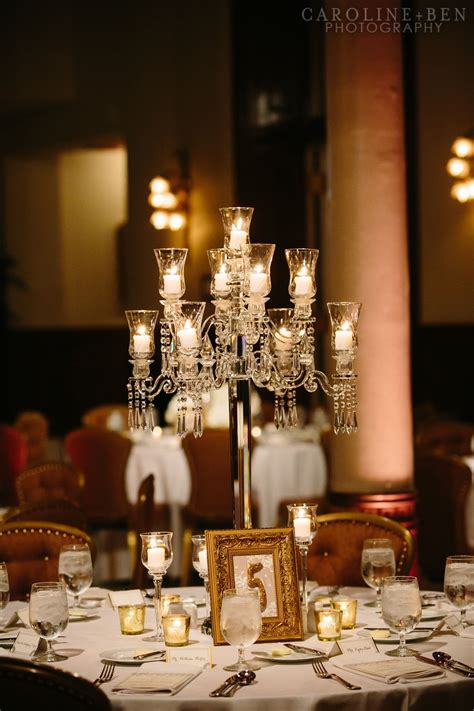 The Medium Centerpieces Will Be Crystal Candelabra With