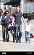 Jennifer Connelly and Paul Bettany pick up their children, Kai and ...