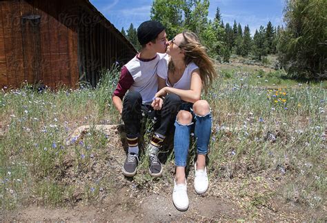 Teen Couple Kissing By Stocksy Contributor Carolyn Lagattuta Stocksy