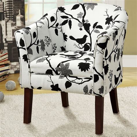 White armchair in front of black wall. Coaster Upholstered Floral Accent Chair in Black and White ...
