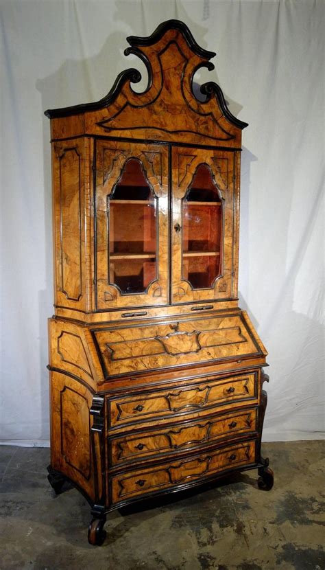 In the dining room, a secretary desk with a glass hutch is a lovely way free up space in your kitchen and display special occasion items. Antique Italian Lombardy Trumeau Secretary Hutch Walnut ...