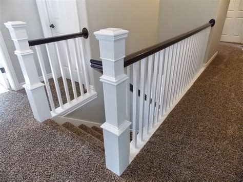 Measure and mark the wall at the bottom and top of the stairs. Remodelaholic | Stair Banister Renovation Using Existing ...
