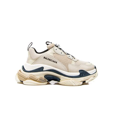Leather accessories and bold trainers finish looks with a slick edge. Balenciaga Triple S Beige | Derodeloper.com