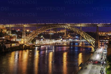 Night View Of Dom Luis I Bridge Over Douro River With Vila Nova De Gaia