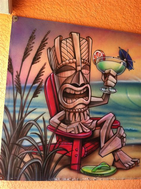 the tiki god on the drink board at the beach bar in florida tiki hawaii hawaiian tiki tiki