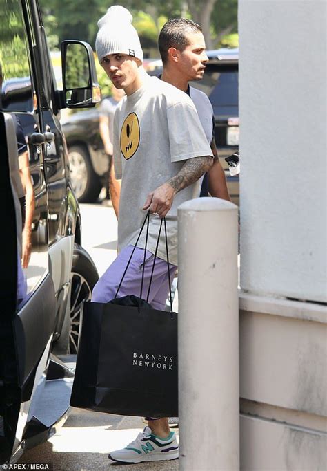 justin bieber rocks his own drew label as he shops with hailey justin bieber justin hailey