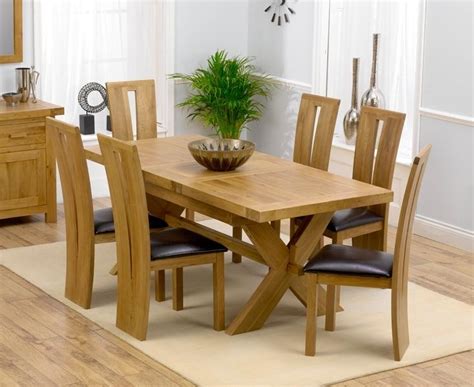 Our collection of dining room furniture is designed to bring quality and class to your home, so you can create an inviting space that's timeless and beautiful. 20 Photos Extendable Oak Dining Tables and Chairs | Dining ...