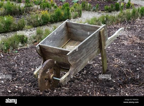 Old Wooden Wheelbarrow High Resolution Stock Photography And Images Alamy