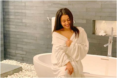 Neha Kakkar Poses In A Bathrobe Husband Rohanpreet Singh Gets Blown