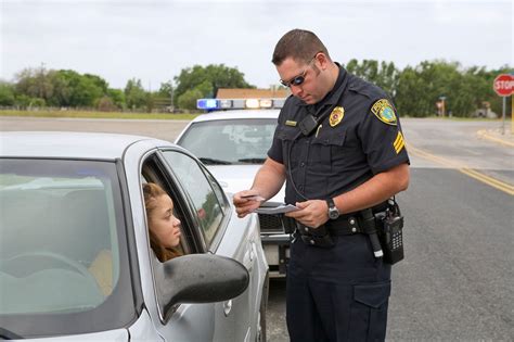 why do police touch the back of your car when they pull you over the us sun