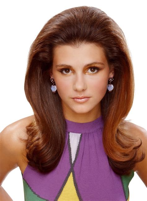 It shows off the length and texture of your hair and also helps in framing your face. Long 60s volume hairstyle with curled out ends