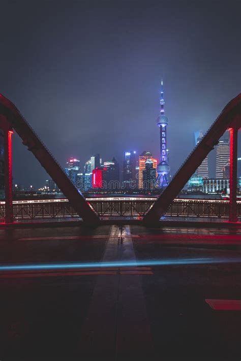Vertical Long Exposure Shot Of Waibaidu Bridge On Suzhou Creek At Night