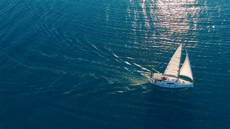 Aerial View Yacht Sailing On Open Sea At Sunny Day Sailing Boat In