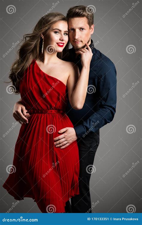 Couple Fashion Beauty Beautiful Woman In Red Dress And Elegant Man Stock Image Image Of Adult