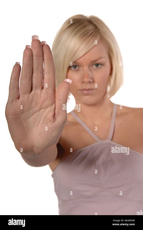 Blonde Women Holding Hand Up Saying Stop Right There Isolated On White