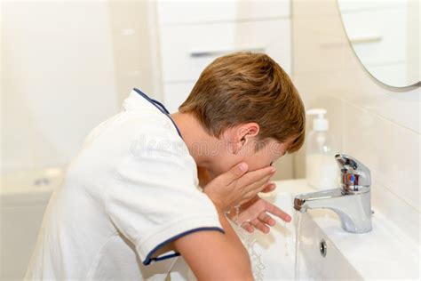 Preteen Washes Her Face In The Toilet Sink Stock Image Image Of