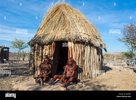 Himba Women In Front Of Their Hut Kaokoland Namibia Africa Stock