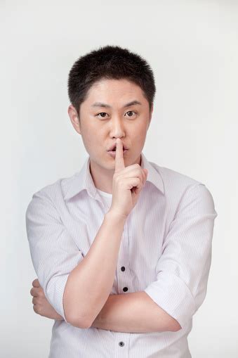 Chinese Man Making Shhh Gesture Stock Photo Download Image Now Men
