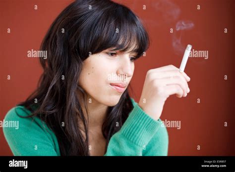 Teenage Girl Smoking A Cigarette Stock Photo Alamy