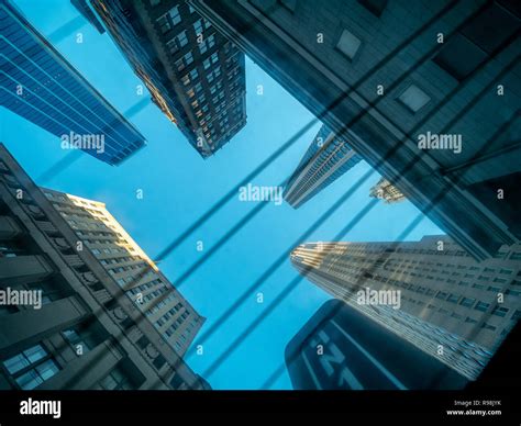 Looking Up Manhattan Skyscrappers With Clear Skies Stock Photo Alamy