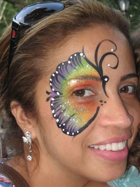 Rainbow butterfly | Butterfly face paint, Butterfly face, Rainbow butterfly