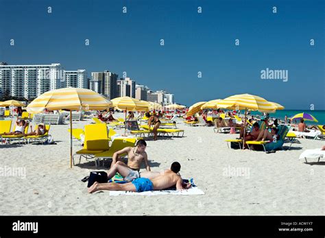 Sunbathing On Miami S South Beach Florida Usa Stock Photo Alamy