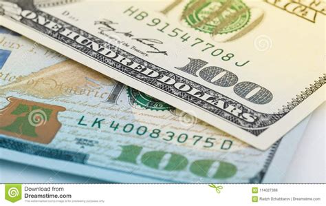Closeup New And Old American Money Hundred Dollar Bill Us