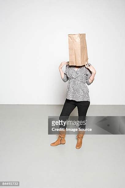 Paper Bag Head Woman Photos And Premium High Res Pictures Getty Images