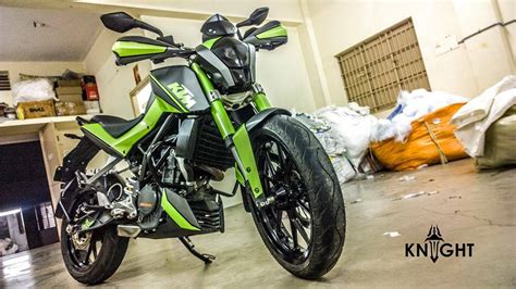 The ktm 200 duke now looks sharper and identical to the 250 duke. Modified Duke 200 in Green shade by KNIGHT Auto Customizers