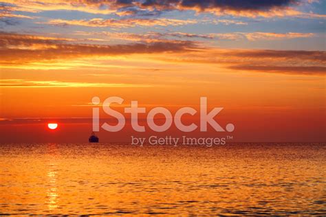 Beautiful Cloudscape Over The Sea Sunrise Shot Stock