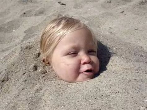 Little Girl Covered In Sand Wants More Sand Video